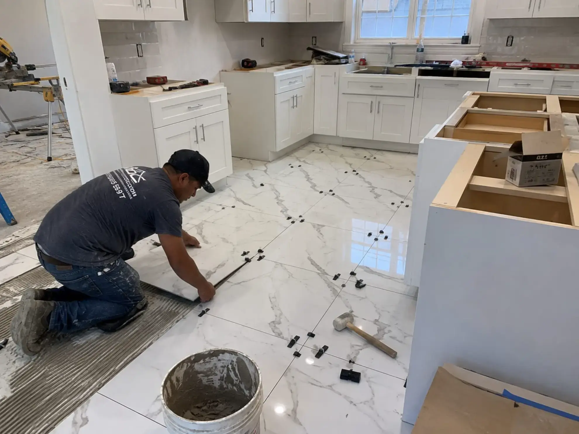 Kitchen tile flooring in Manhattan by Milan Design Construction